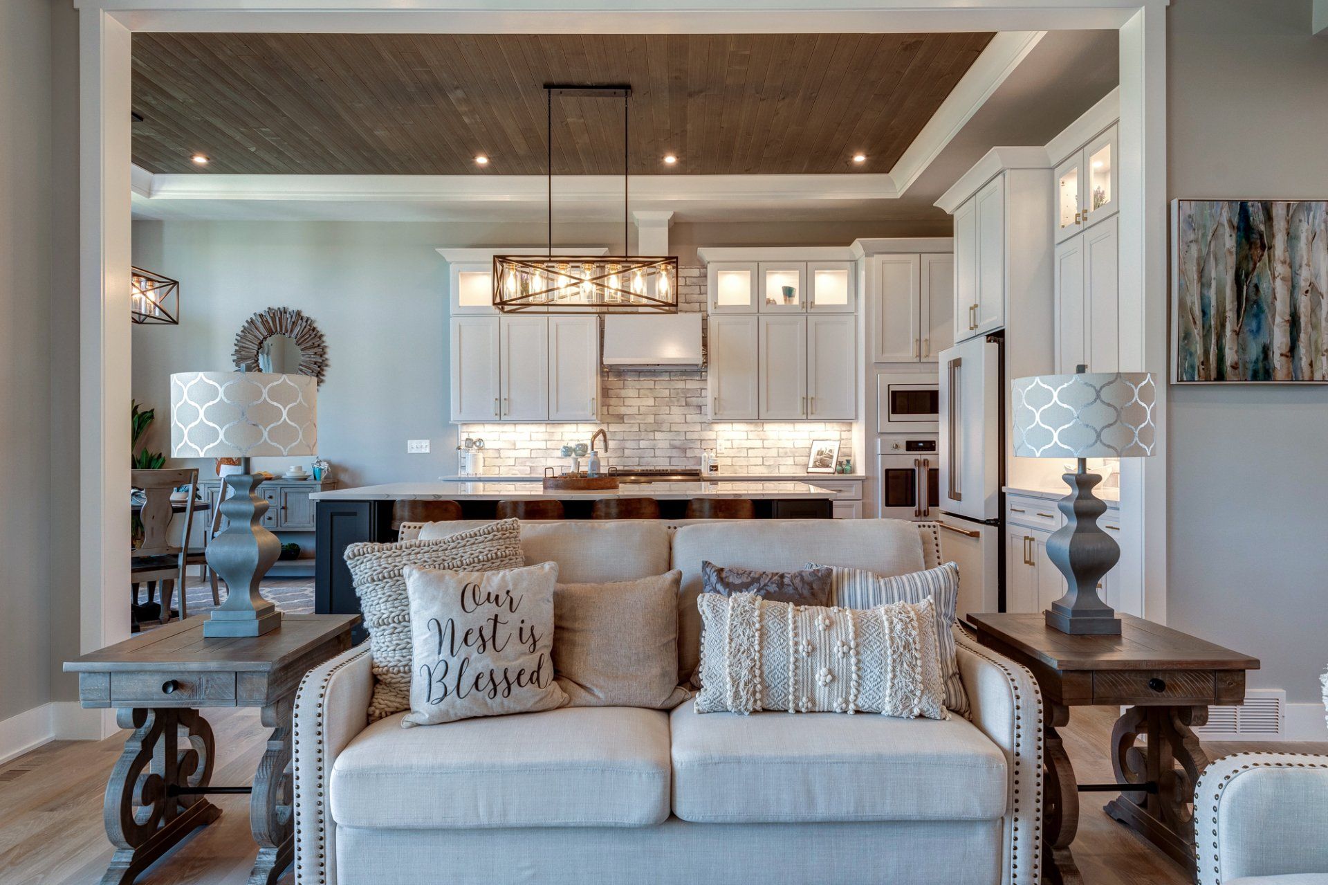 loveseat with kitchen in background