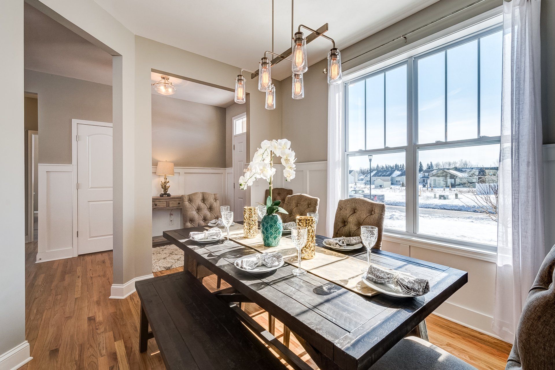 dining room and front entryway in background