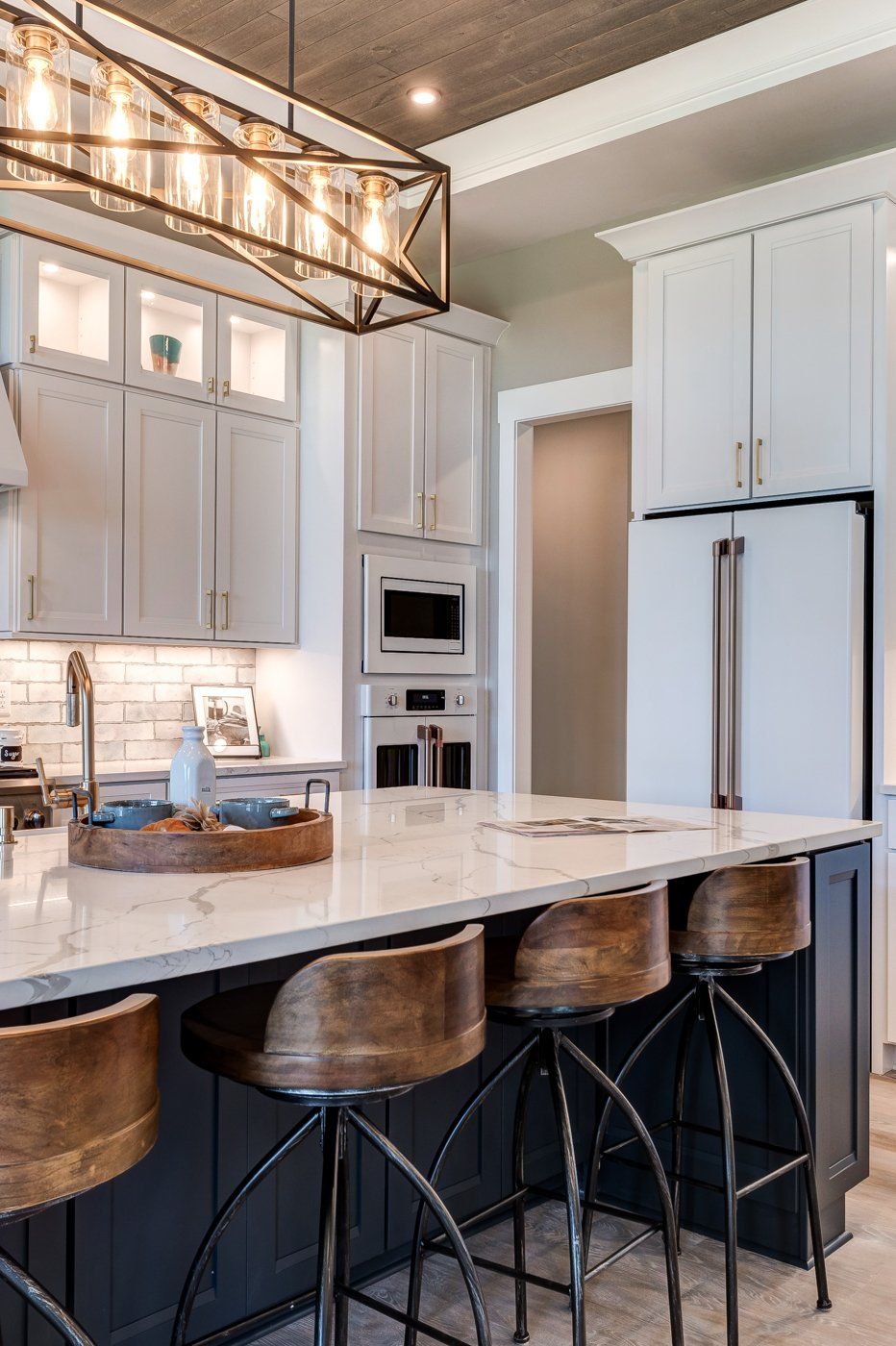 rectangular lighting over island with seating