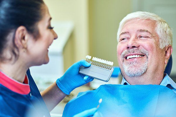 Dentist and Patient in the Dental Clinic — McAllen, TX — Dr. Joey Cazares & Associates
