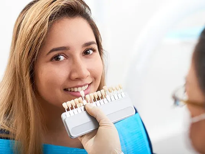 Young Woman Visiting Doctor for Teeth Whitening — McAllen, TX — Dr. Joey Cazares & Associates Young Woman Visiting Doctor for Teeth Whitening — McAllen, TX — Dr. Joey Cazares & Associates