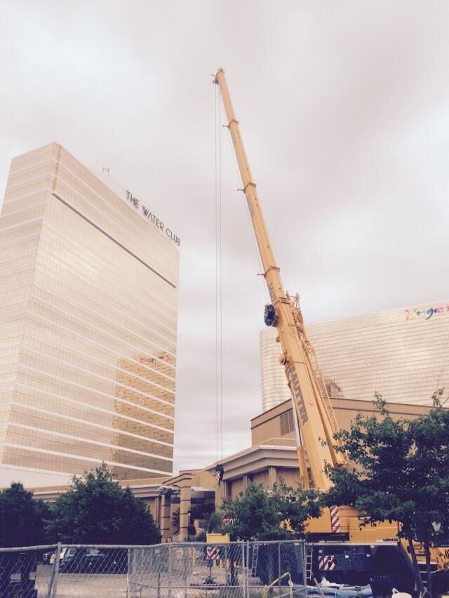 Building with a crane beside — Landscape Contruction in Egg Harbor Township, NJ