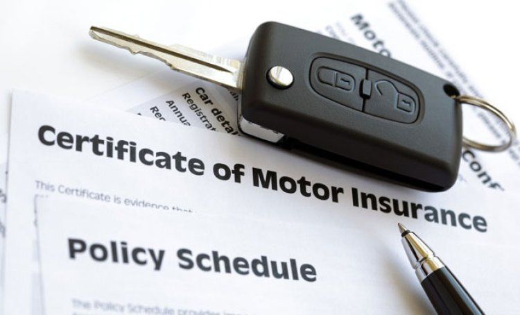 car key and insurance paper