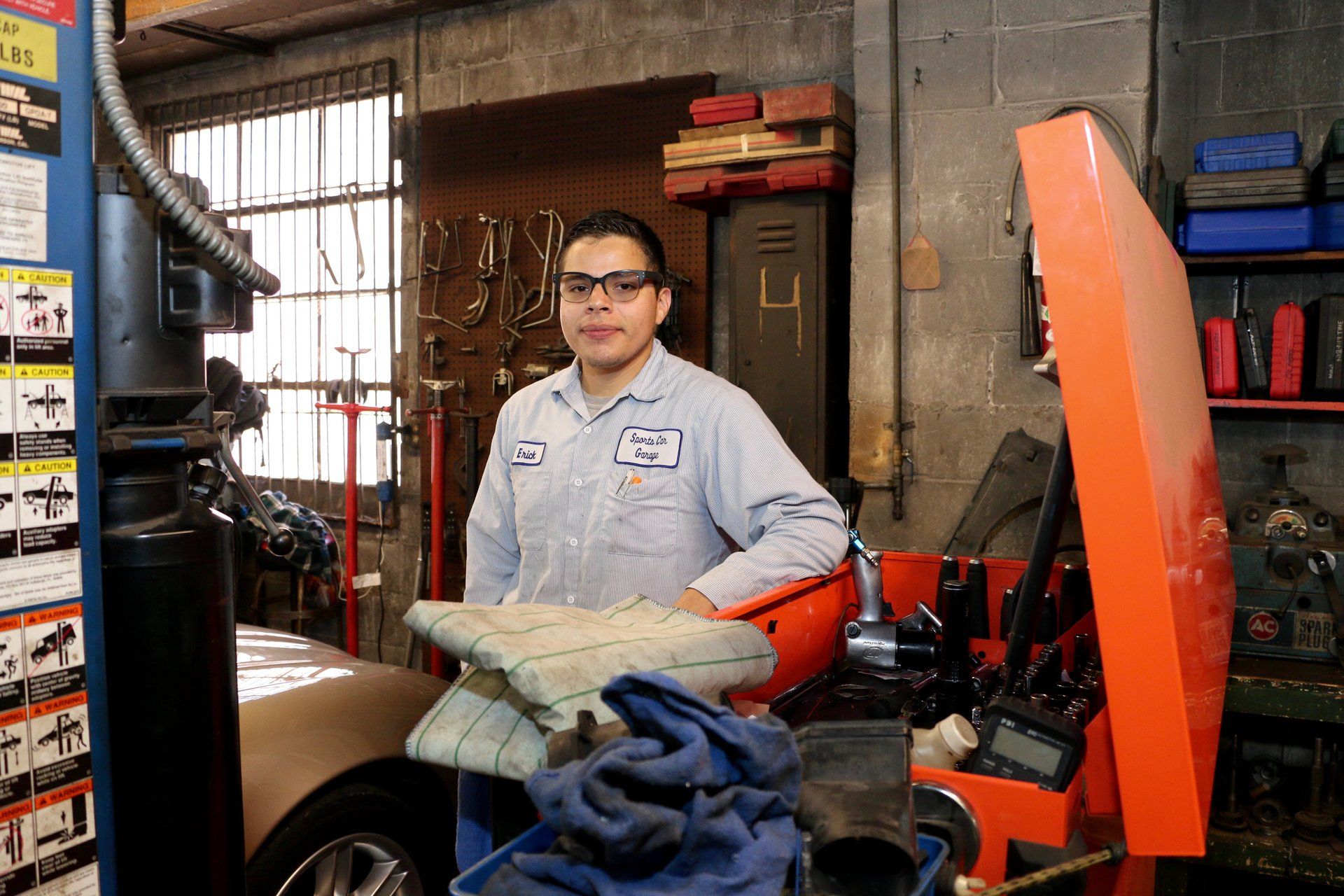 Erick, an expert with foreign cars, is part of the Sports Car Garage dream team