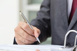 Probate — Business Man Signing Papers in Maryville, TN Probate — Business Man Signing Papers in Maryville, TN