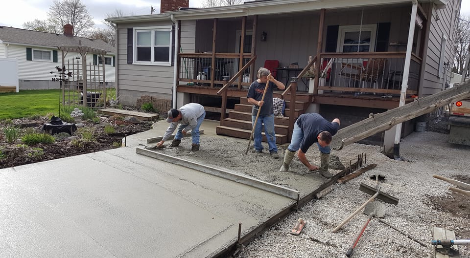 Local Driveway Contractor — Men Working on the Driveway in Niles, OH