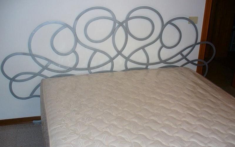 Spalliera letto in ferro battuto