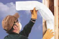 Insulation contractor working with batts in Anchorage, AK
