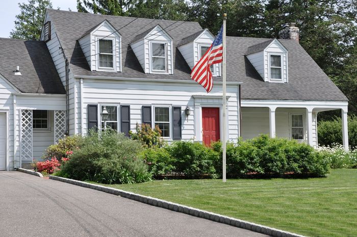big house with flag