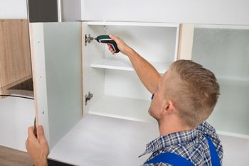 individual using the bio metric system to enter the building