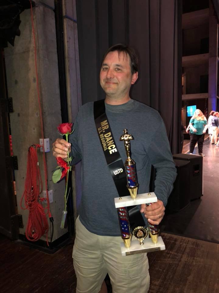 Man Holding Trophy — Cicero, NY — CMC Dance Company