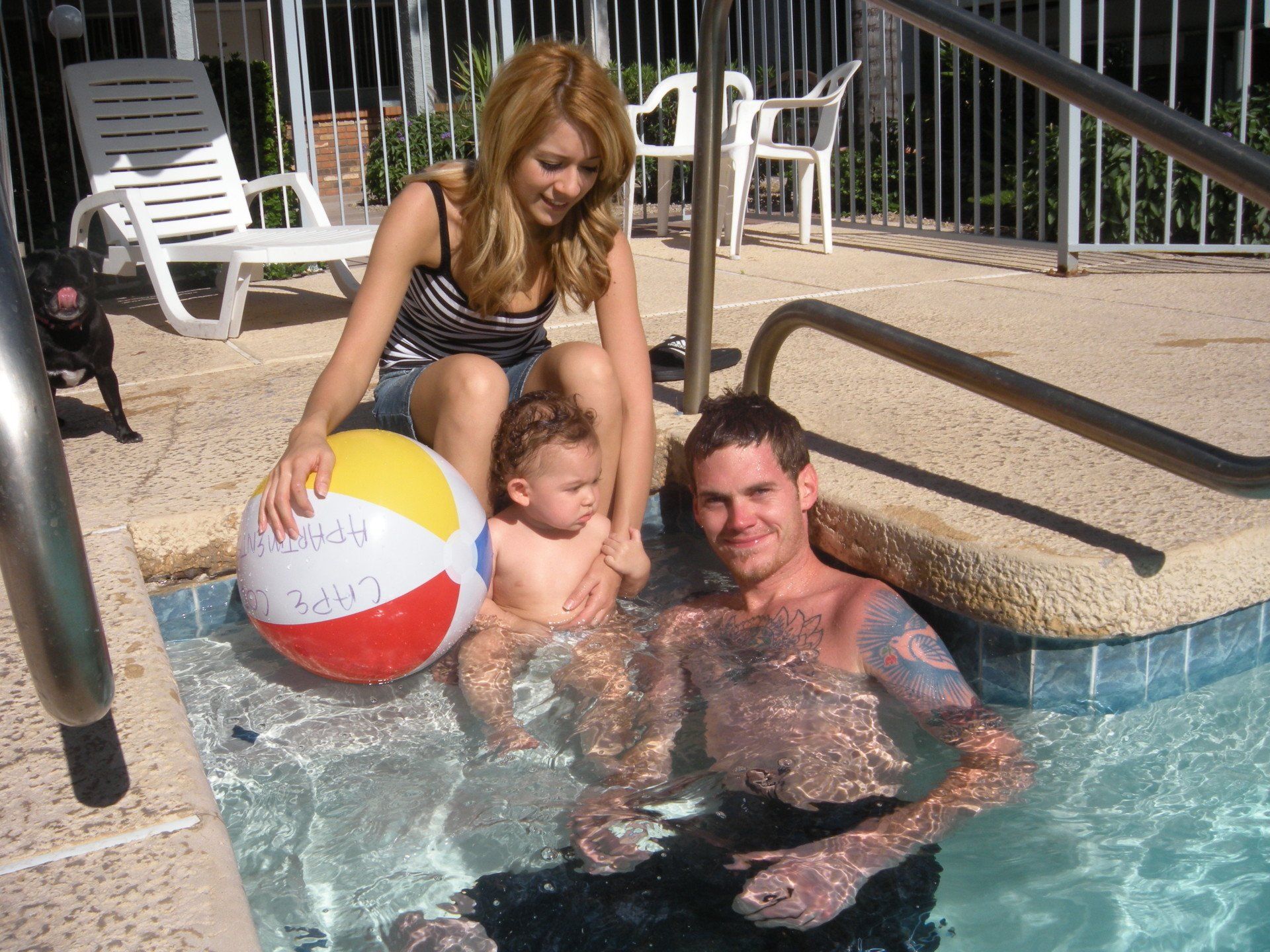 Family by the pool photo