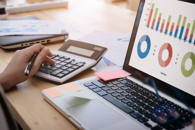 Accountant Using Calculator — Middletown, RI — Nicole R. Gray & Associates Accountant Using Calculator — Middletown, RI — Nicole R. Gray & Associates