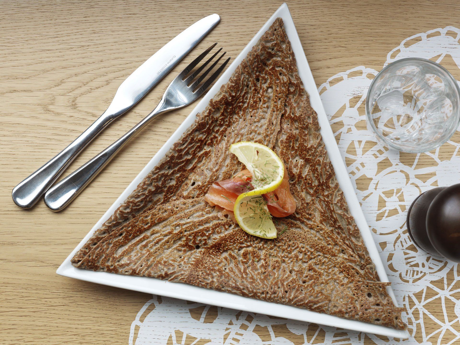 La Petite Bretagne, French Crepe, Pancake, good food, tasty food, restaurant, hammersmith, crepe on a plate, desert, pudding, half eaten meal,  triangle shaped plate, galette, savory pancake, savory crepe, eating,