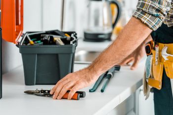 man with repair tools