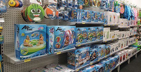 Shelves Full Of Inflatable Pool Toys & Accessories — Toys in Alice Springs, NT Shelves Full Of Inflatable Pool Toys & Accessories — Toys in Alice Springs, NT
