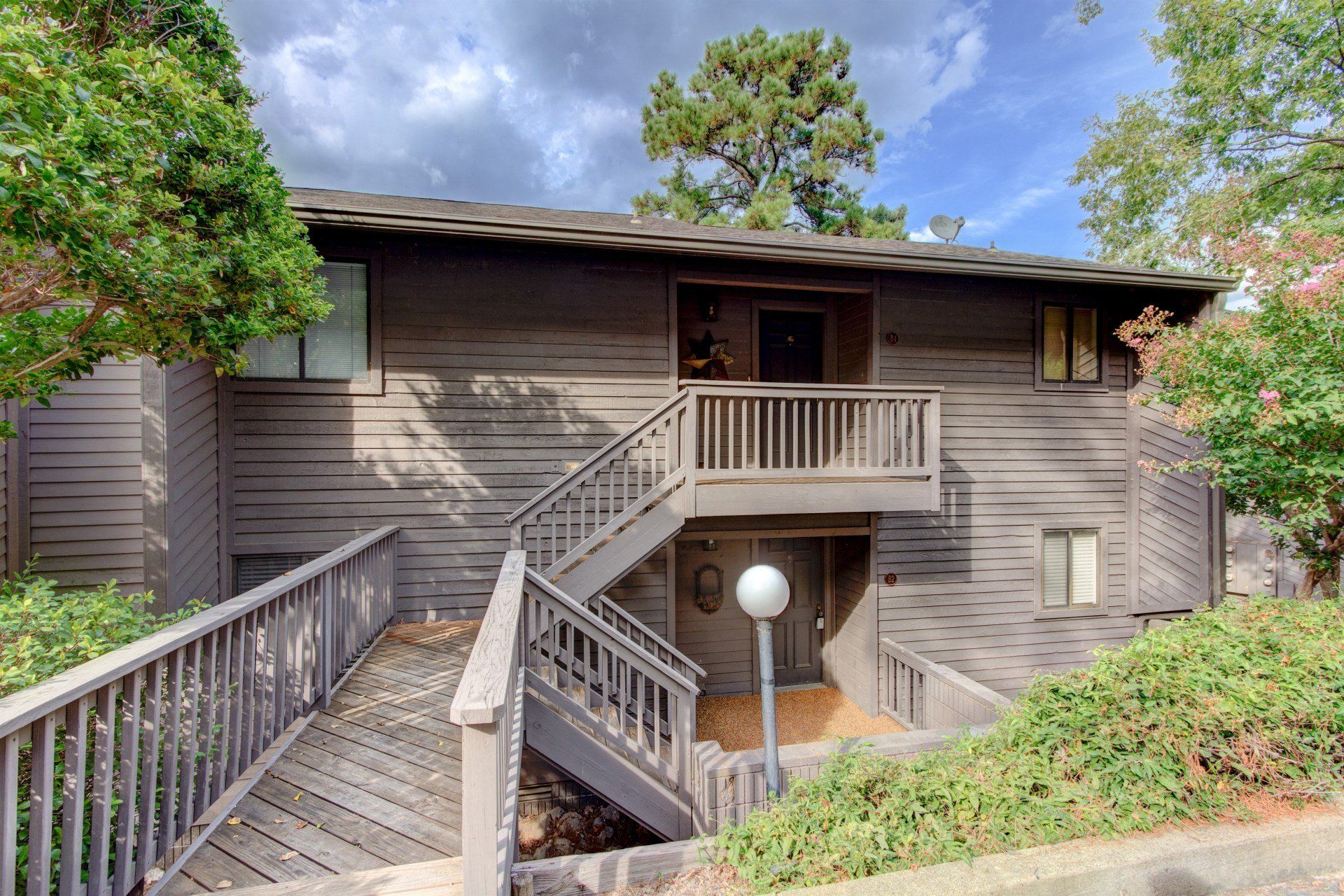 A house with stairs leading up to the second floor