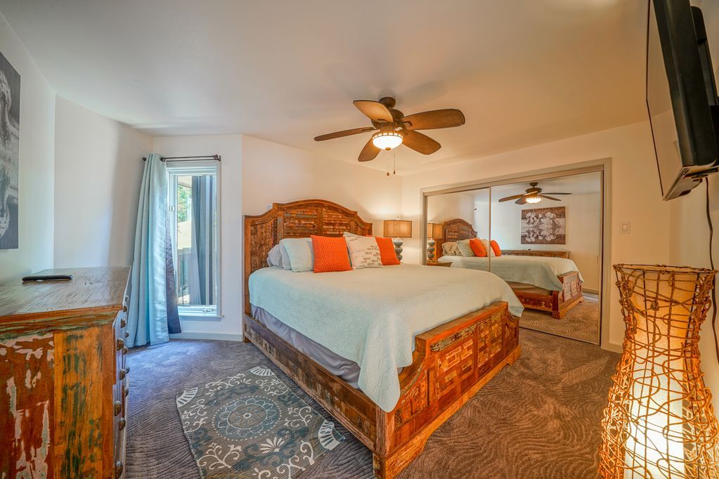 There is a large bed in the middle of the room.