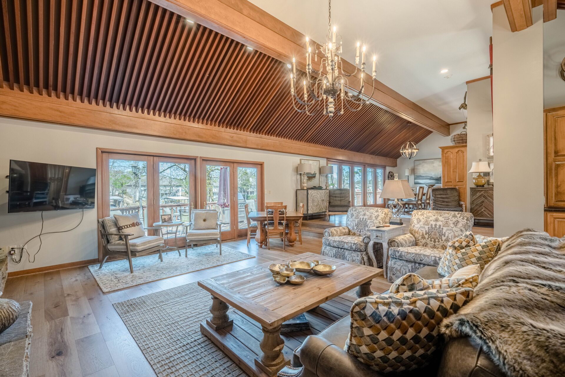 A living room filled with furniture and a flat screen tv.
