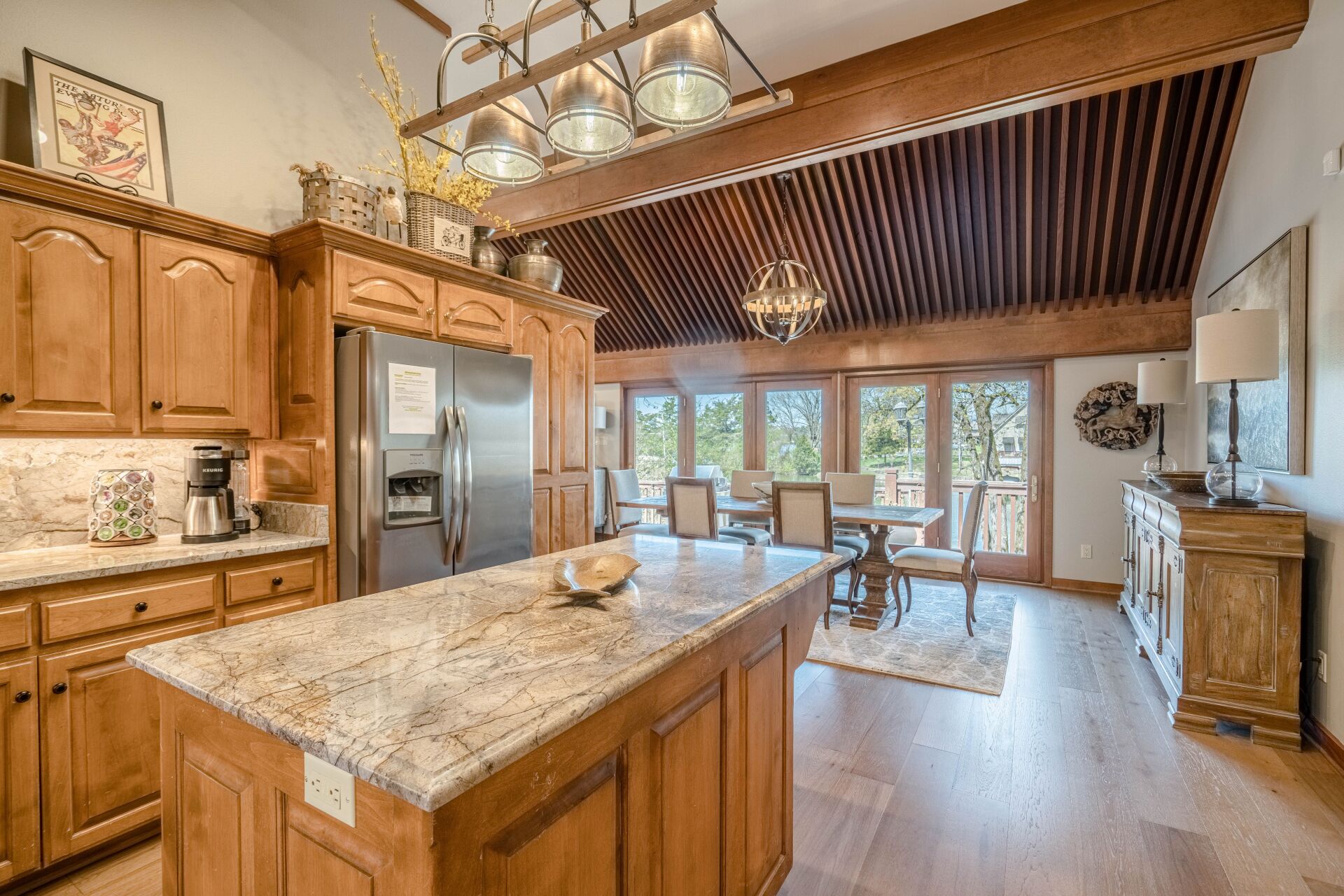 There is a large island in the middle of the kitchen.