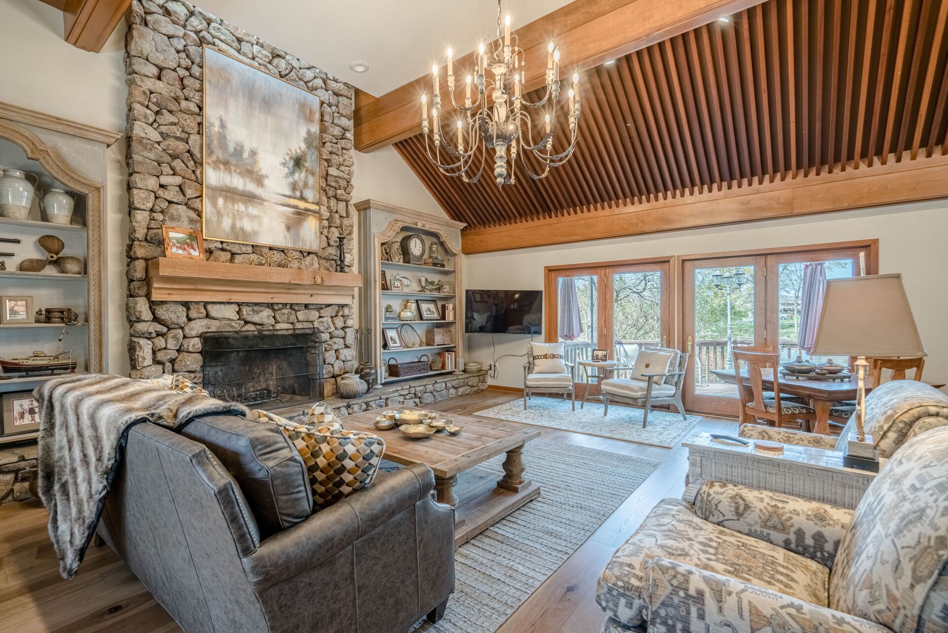 A living room filled with furniture and a fireplace.