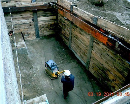 Man on Construction site - Pile Driving in Canton, MA