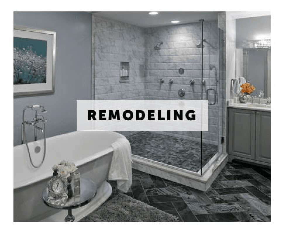 A bathroom with a bathtub and a walk in shower.