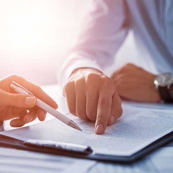 Title Loans — Documents at Desk and Signing Contract in Humble, TX Title Loans — Documents at Desk and Signing Contract in Humble, TX