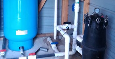 Picture of a water tank being replaced