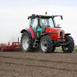 Alternator Repair — Farmer in Tractor in Salinas, CA