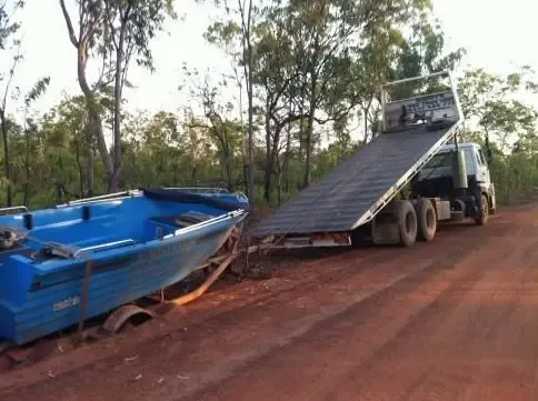 Transporting Lawn Mower and ATV — Rossy’s Tilt Tray Hire in Palmerston, NT