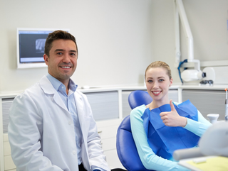 Tooth Extractions — Woman on a Dental Procedure in Orland Park, IL Tooth Extractions — Woman on a Dental Procedure in Orland Park, IL