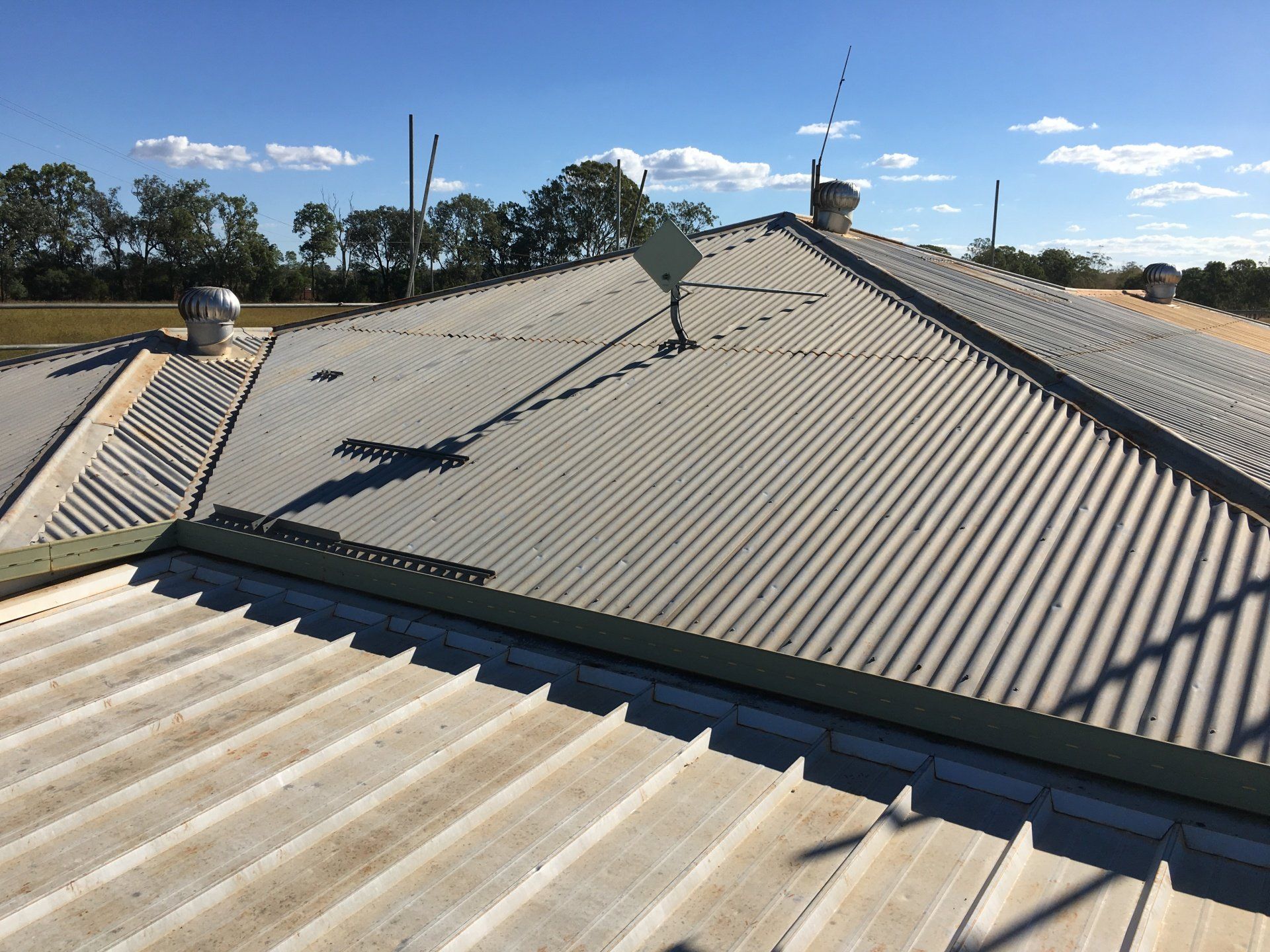 Insulated metal re-roof roof replacement