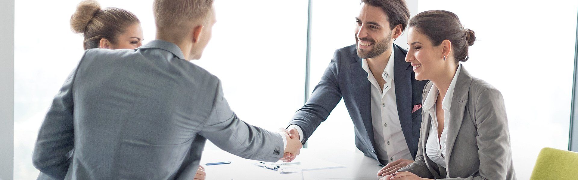 two men shaking hands