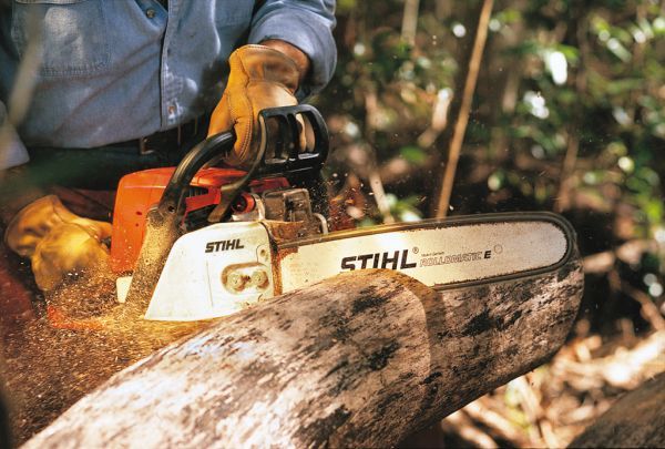 Chainsaws — Chainsaw With Helmet in Turlock, CA Chainsaws — Chainsaw With Helmet in Turlock, CA