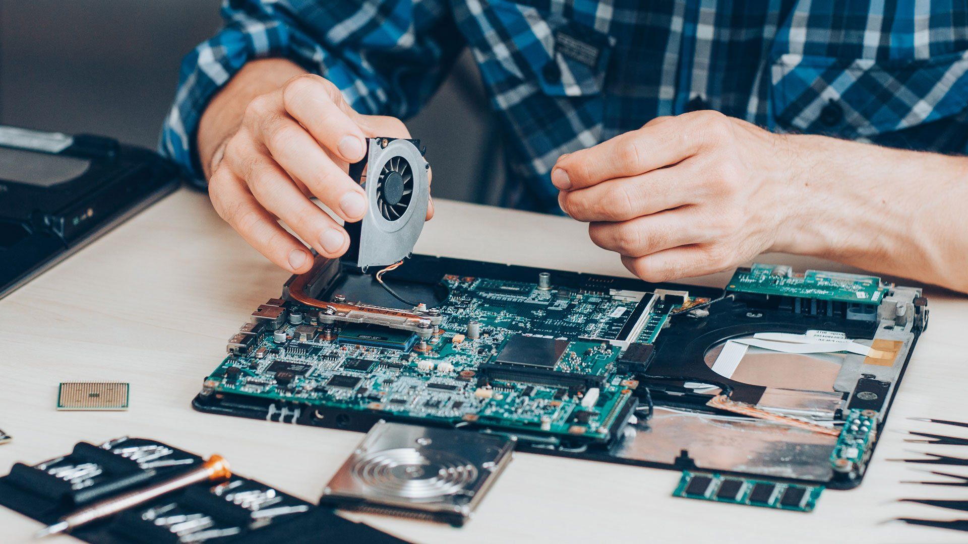Technician Repairing Laptop — Sparks, NV — Friendly Computers