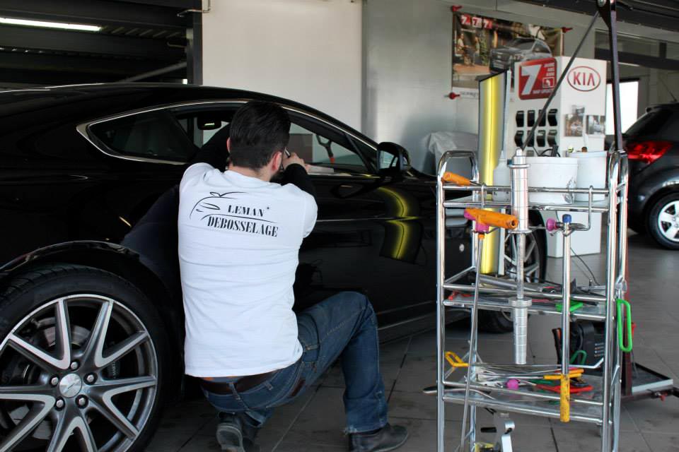 man working on car