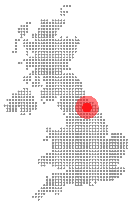 Dotted map of the UK with a red target marker in northern England