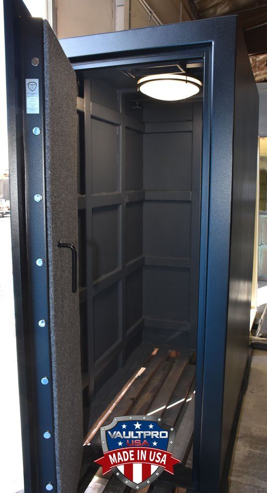 Walk-in vault room and storm shelter with lighting and electrical.