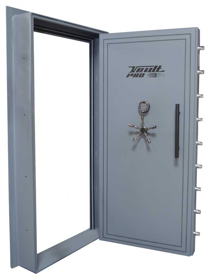 Open gray vault door with wheel handle, standing ajar on a large metal safe.