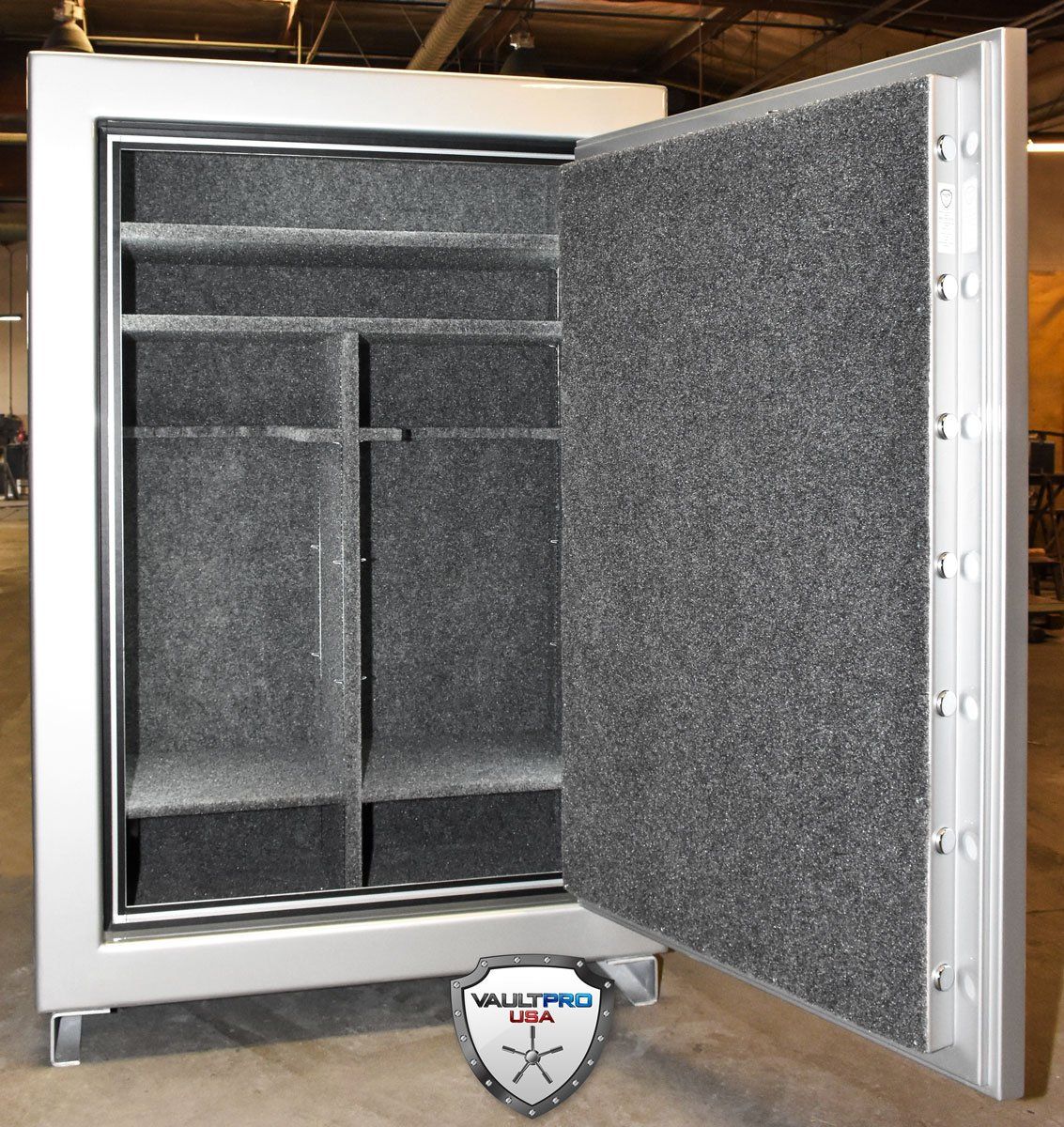 big gun safe interior with rifle rack and shelves