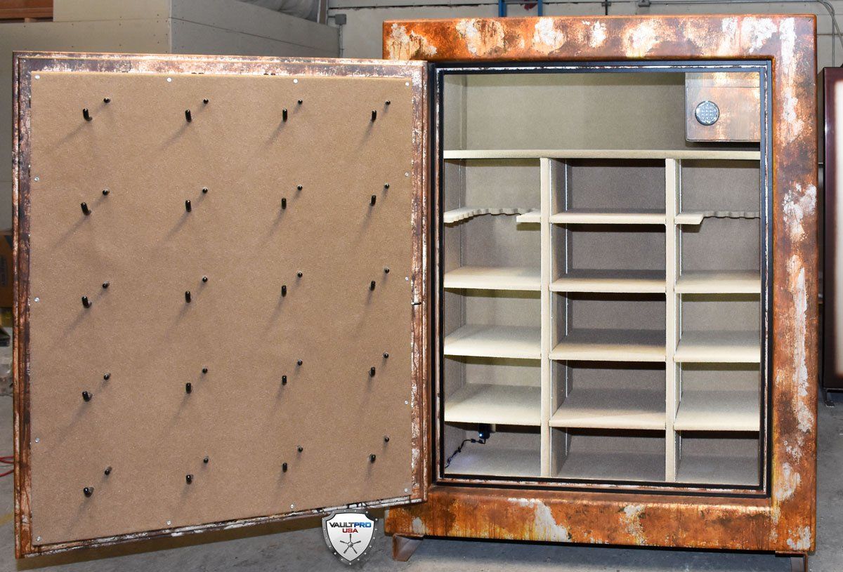 A rusty safe with the door open and shelves inside