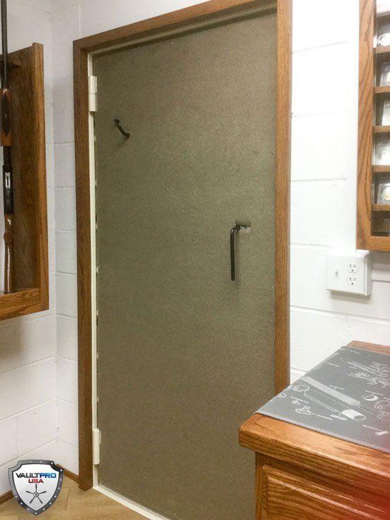 Frosted glass shower door with wooden frame in a tiled bathroom