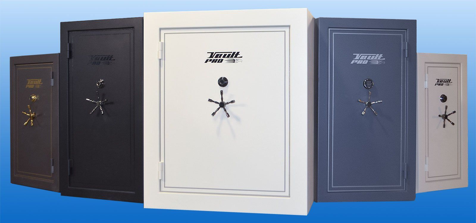 Five assorted safes in black, white, blue, and beige lined up side by side.