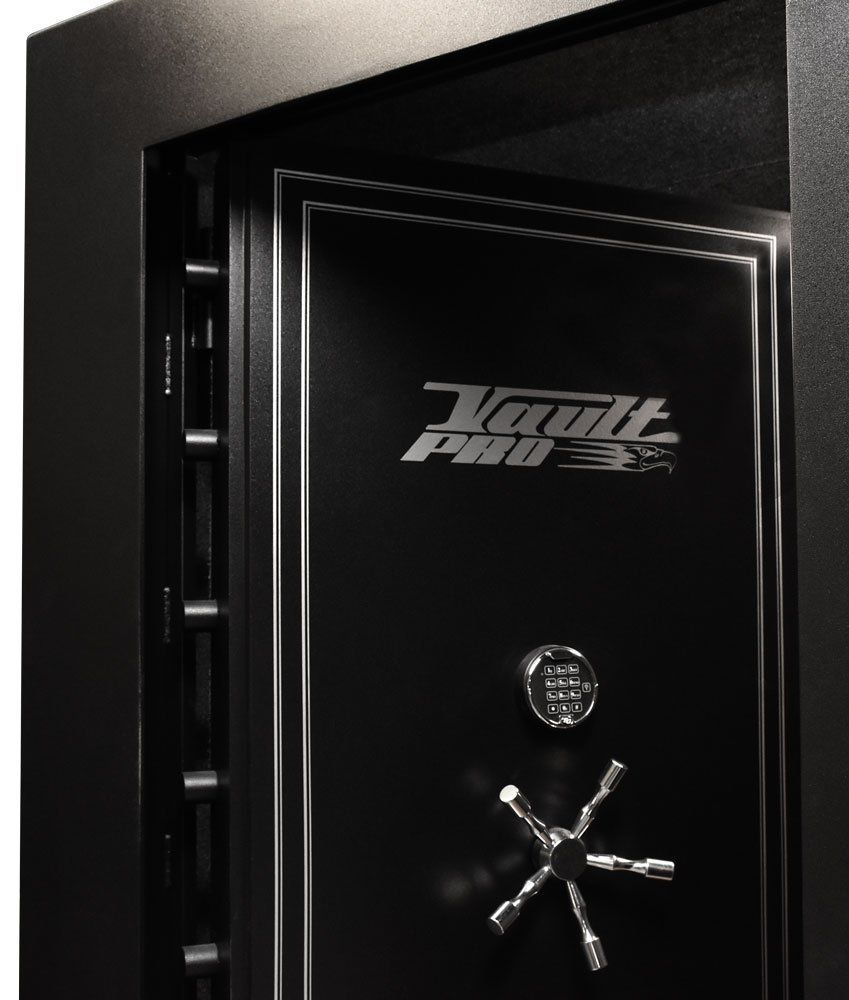 Black safe with silver handle and logo on the door, partially open against a dark background