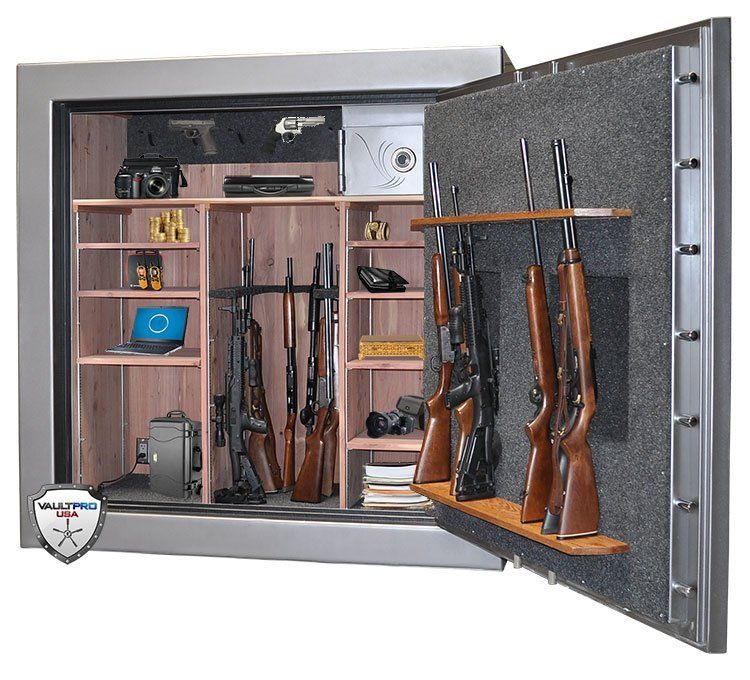 Open gun safe with rifles stored inside and on the door, gray metal exterior and wood shelving interior