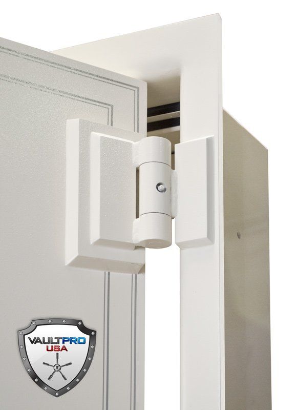 White security door hinge with shield lock on a light gray door frame