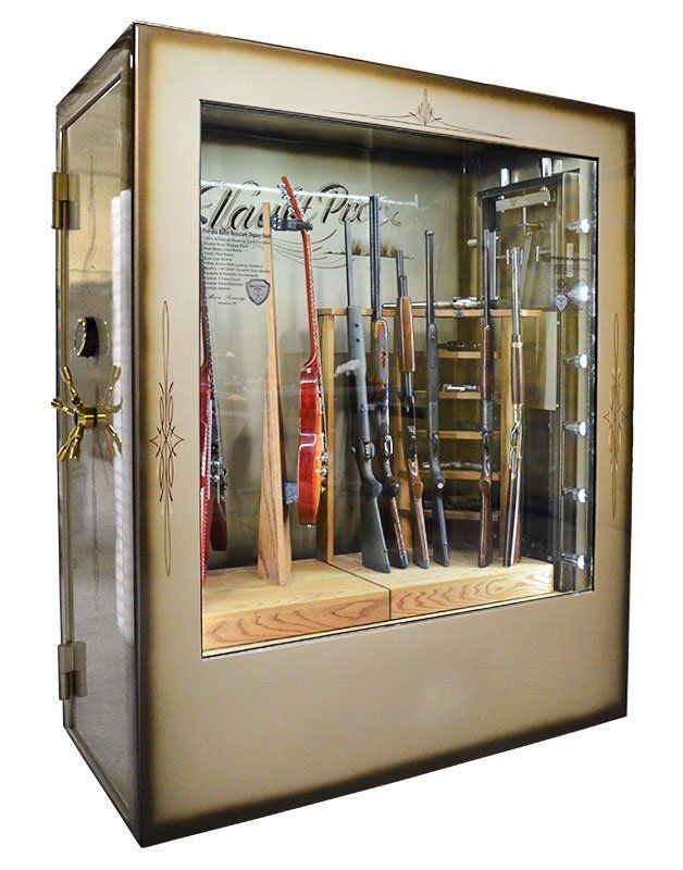 Gun cabinet with glass door displaying several rifles and shotguns inside