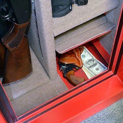 Red safe with hidden gun, holster, and cash inside.