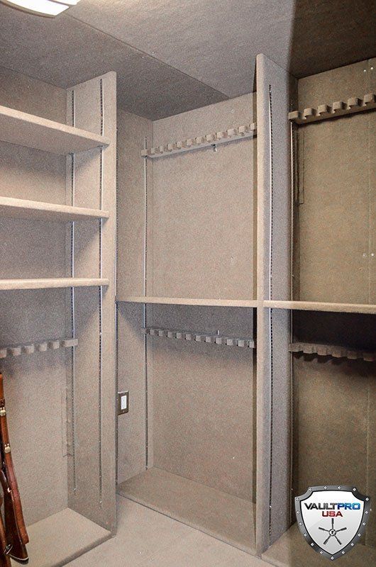 Custom Walk in Shelter Gun room holds hundreds of weapons.